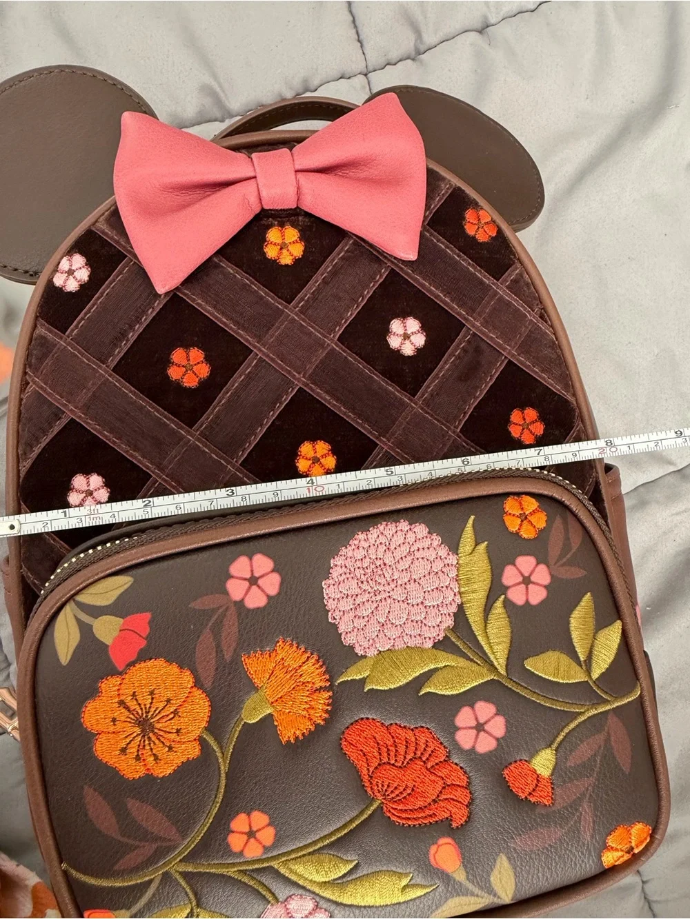 Loungefly Fall Floral Embroidered Brown Backpack with Pink Bow and applique.